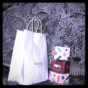 Fossil paper bag & 3 Tin fossil watch containers.